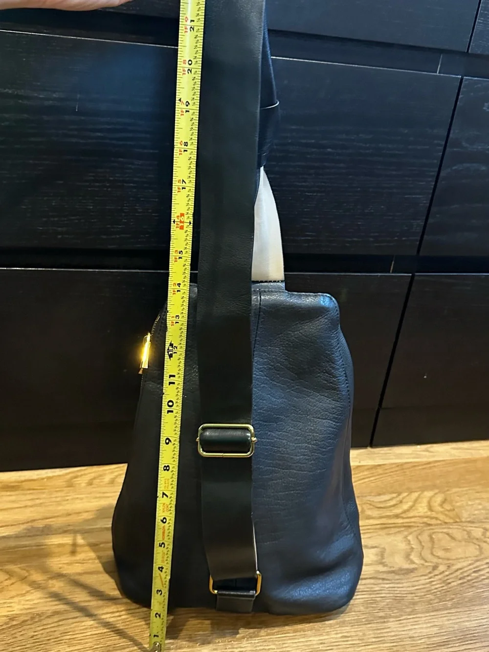 Vince Camuto Black Leather sling Backpack with Gold Accent
